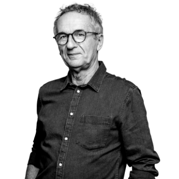 Smiling person with hand on hip.